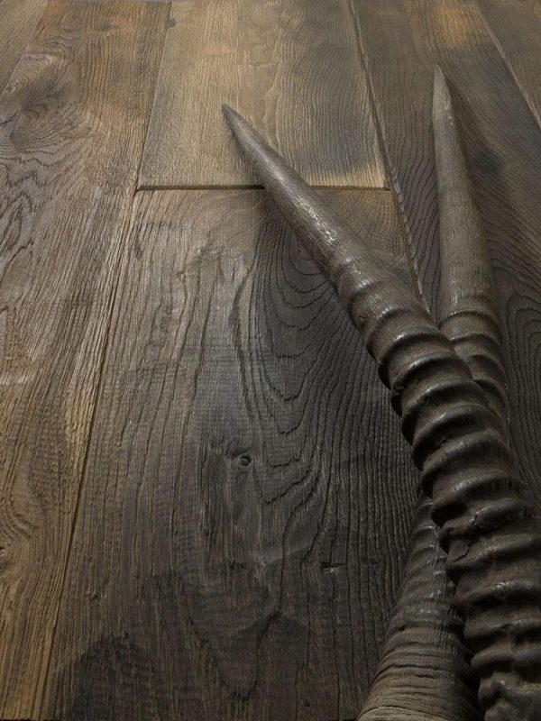 Oak Effetto Storico: deep handplaned, heavy brushed, antiqued coloured and varnished.